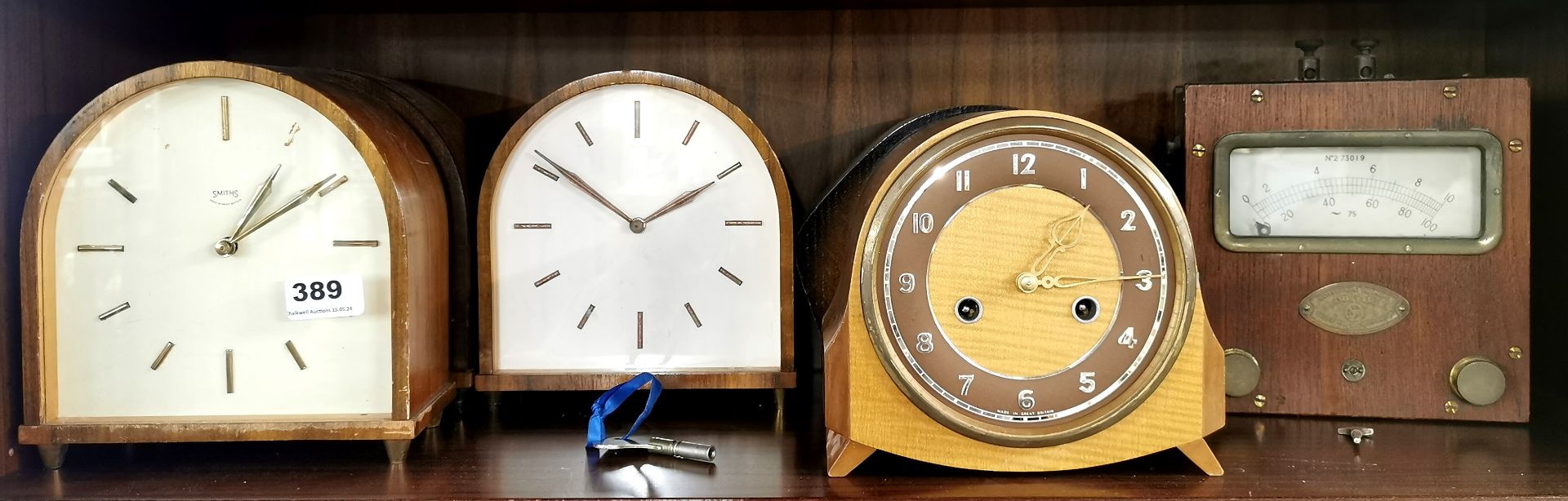 Five vintage mantel clocks and a volt meter, H. 20cm.