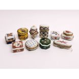 A group of mixed porcelain pill boxes.