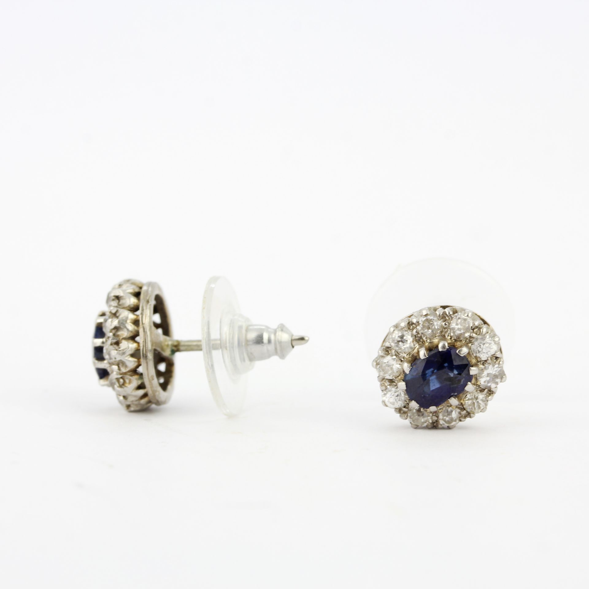 A pair of white metal (tested gold) diamond and sapphire cluster earrings, Dia. 1cm. With rubber - Image 3 of 3