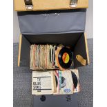 A quantity of 45-RPM single records.