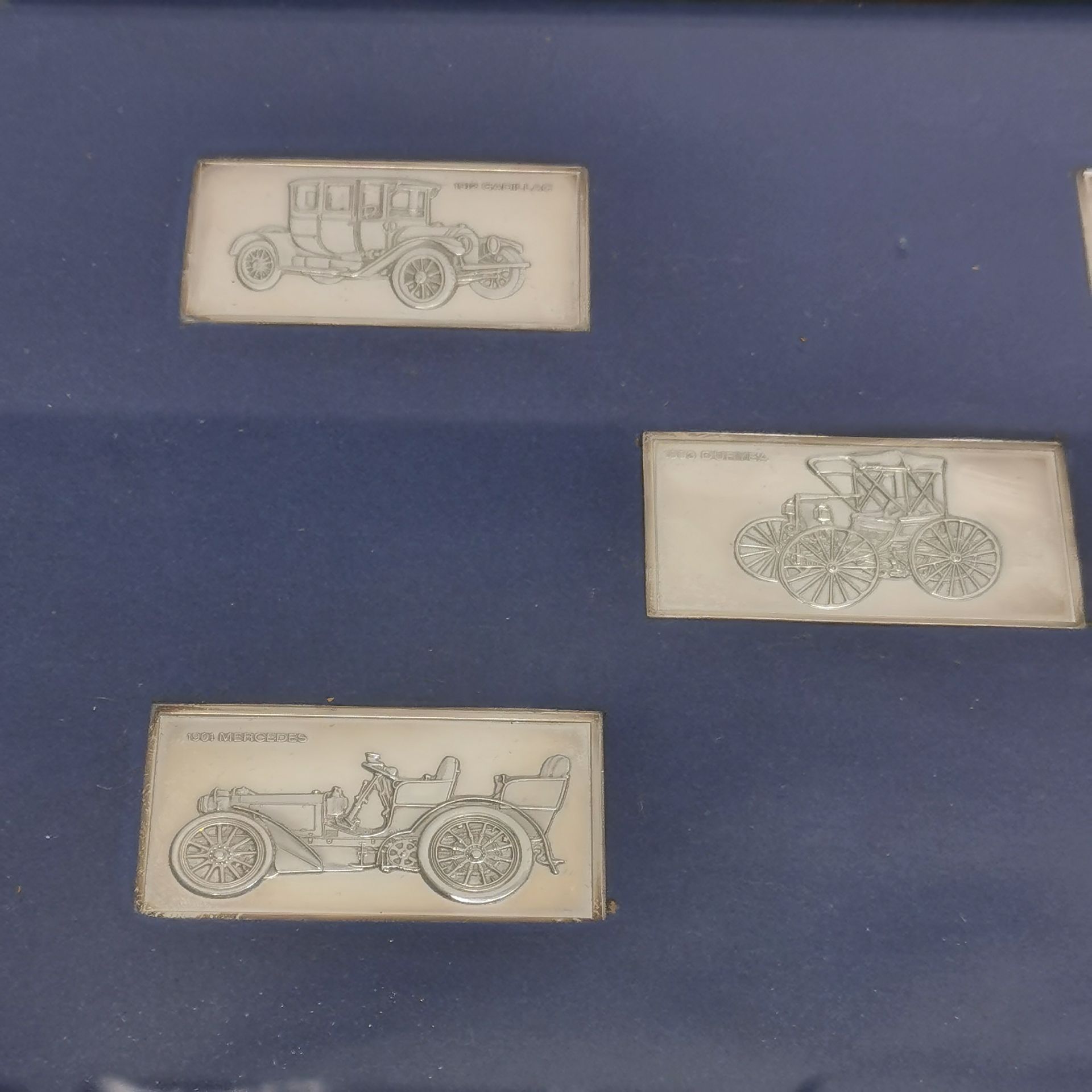 A framed set of five hallmarked silver motor car ingots, frame size 27 x 22cm. - Image 3 of 3