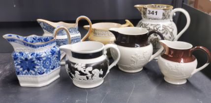 A group of 18th/19thC jugs, largest 12.5cm.