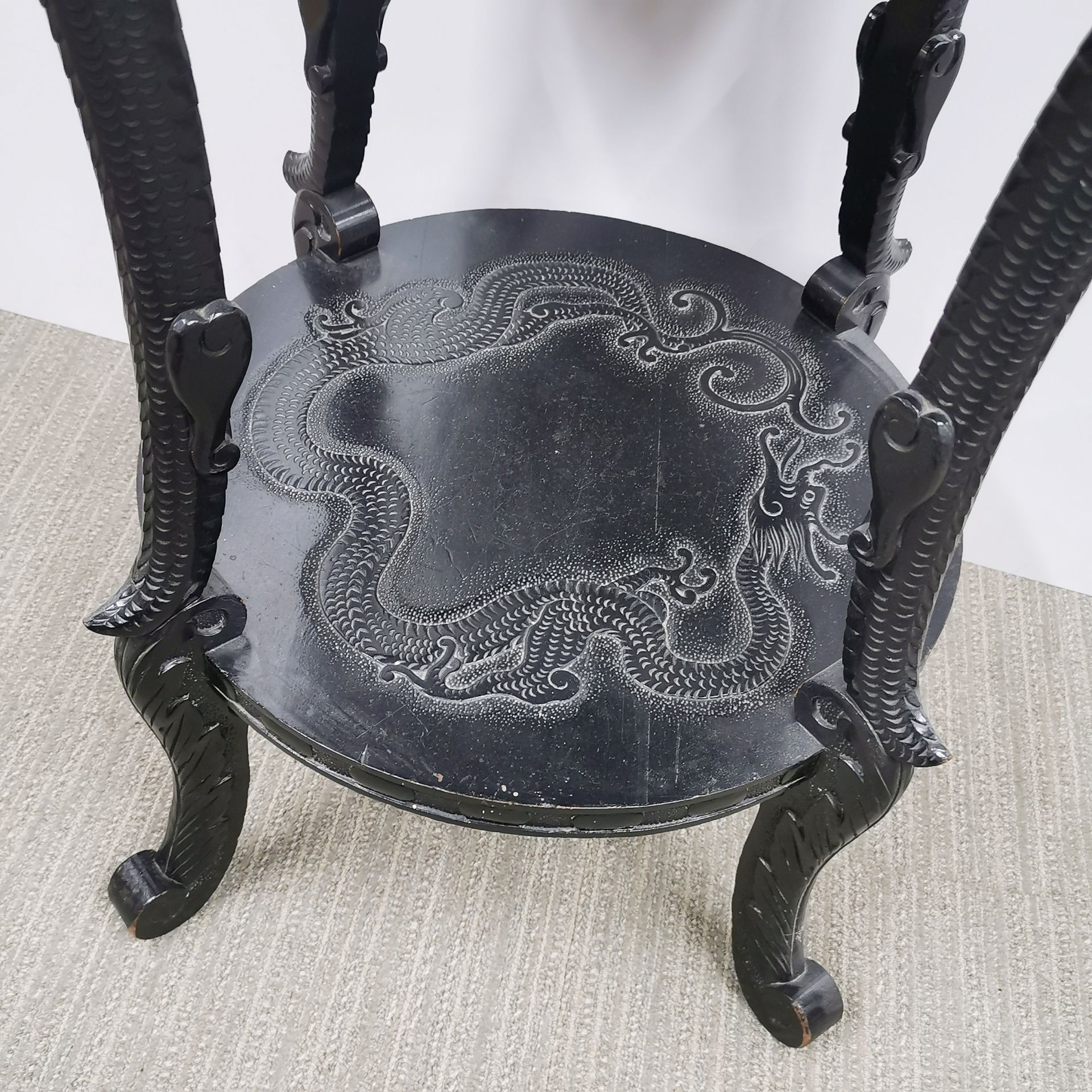 An oriental carved wooden side table decorated with dragons, W. 55cm, H. 77cm. - Image 2 of 3