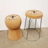 Two metal and cork stools.