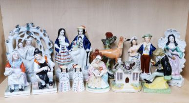 A group of 19th century Staffordshire pottery figures, tallest H. 23cm.