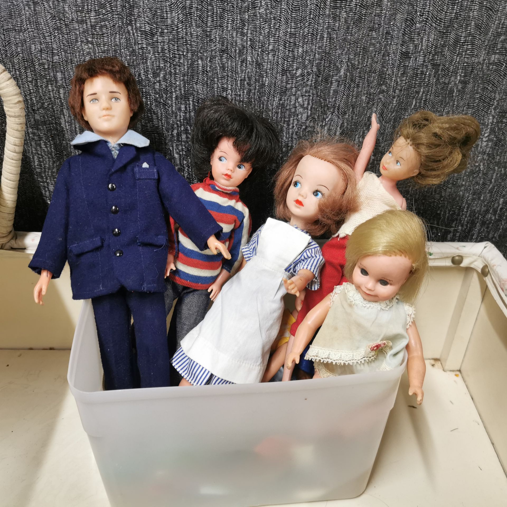 A doll's crib with a group of dolls and other items. - Image 3 of 4
