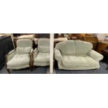 A three piece upholstered lounge suite.
