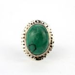 A 925 silver ring set with a large turquoise, ring size R.5.