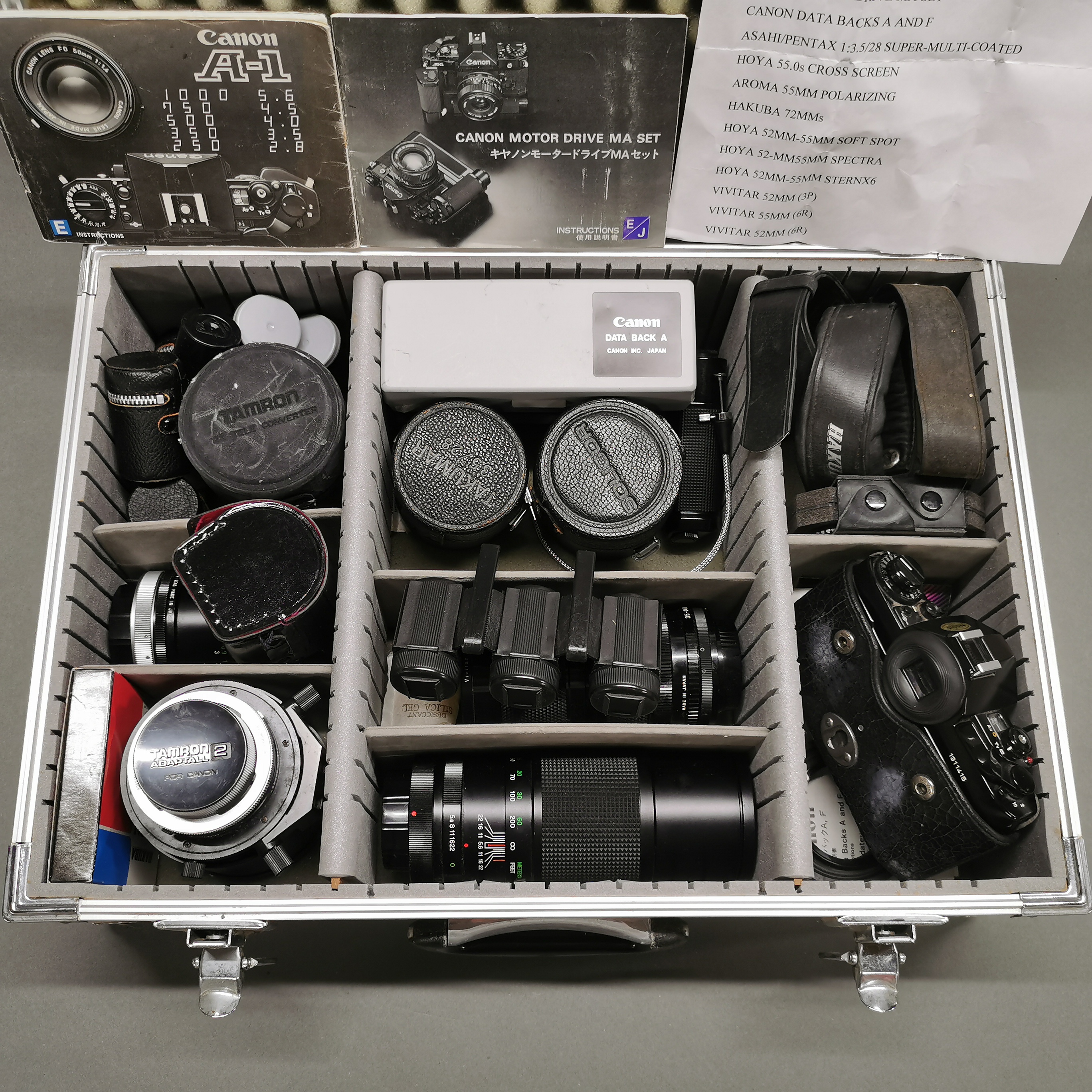 A photographic case containing a Canon A-1 SLR camera, together with a group of mixed lenses etc. - Image 2 of 7