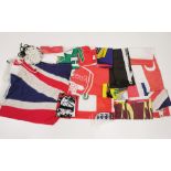 A wooden box of mixed flags and pennants.