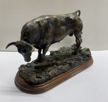 A large cold cast model of a bull, L. 35cm, H. 22cm.