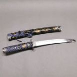 A decorative wakazachi dragon detailed short sword in a wooden saya, L. 53cm.