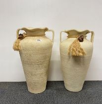 Two large terracotta urns, H. 60cm.