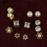 Six pairs of 9ct yellow gold stone set stud earrings, largest L. 0.5cm.