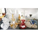 A group of glass perfume bottles, tallest 24cm.