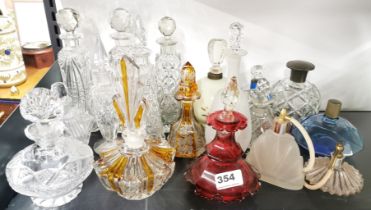 A group of glass perfume bottles, tallest 24cm.