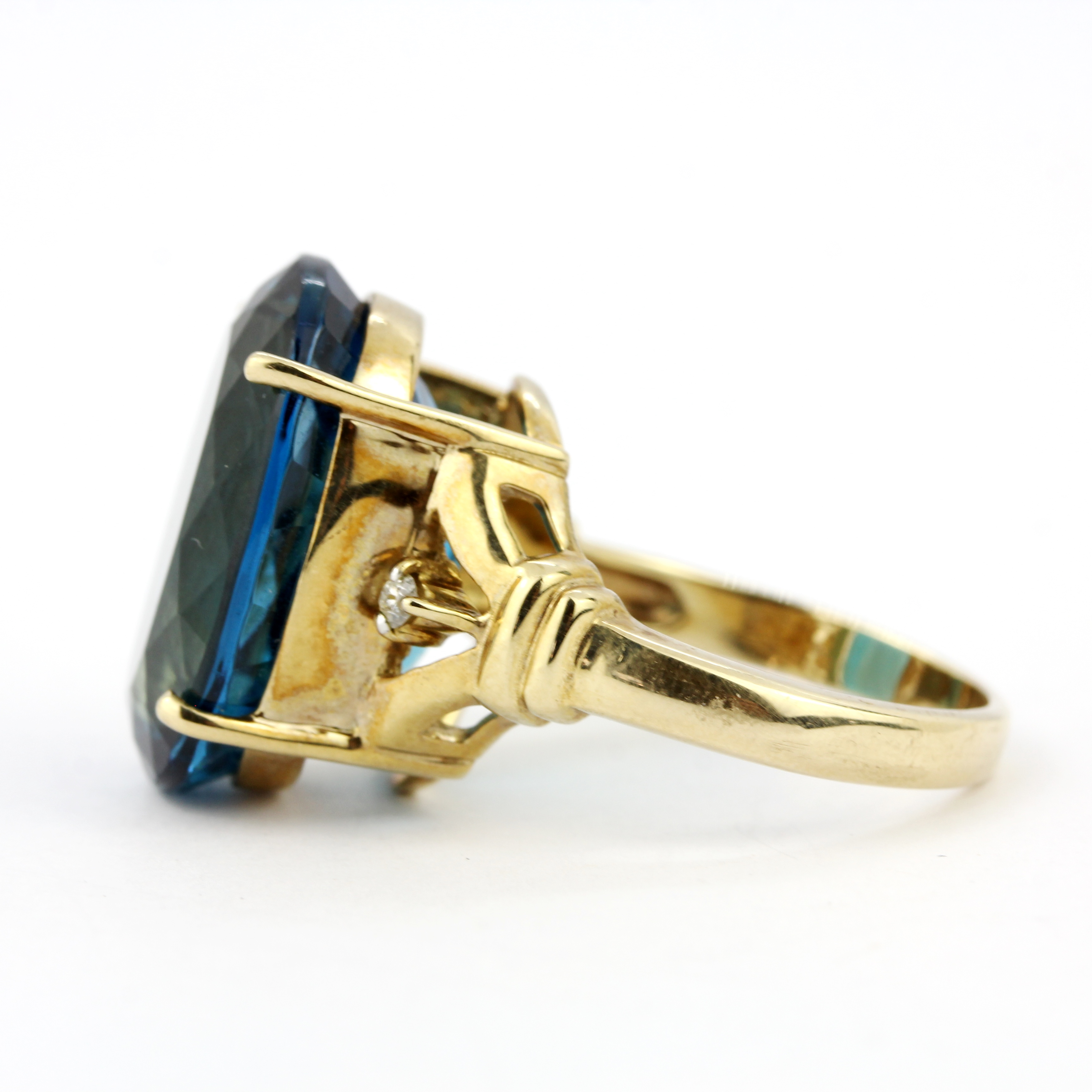 A 9ct yellow gold ring set with a large blue topaz and diamonds, ring size R.5. - Image 2 of 4