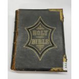 A large 19thC leather bound family Bible, 34 x 28 x 9cm.