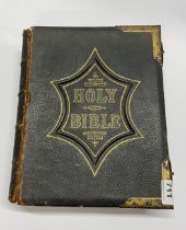 A large 19thC leather bound family Bible, 34 x 28 x 9cm.