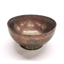 A 19thC Himalayan hammered and engraved copper bowl, Dia. 19.5cm, H. 9cm.