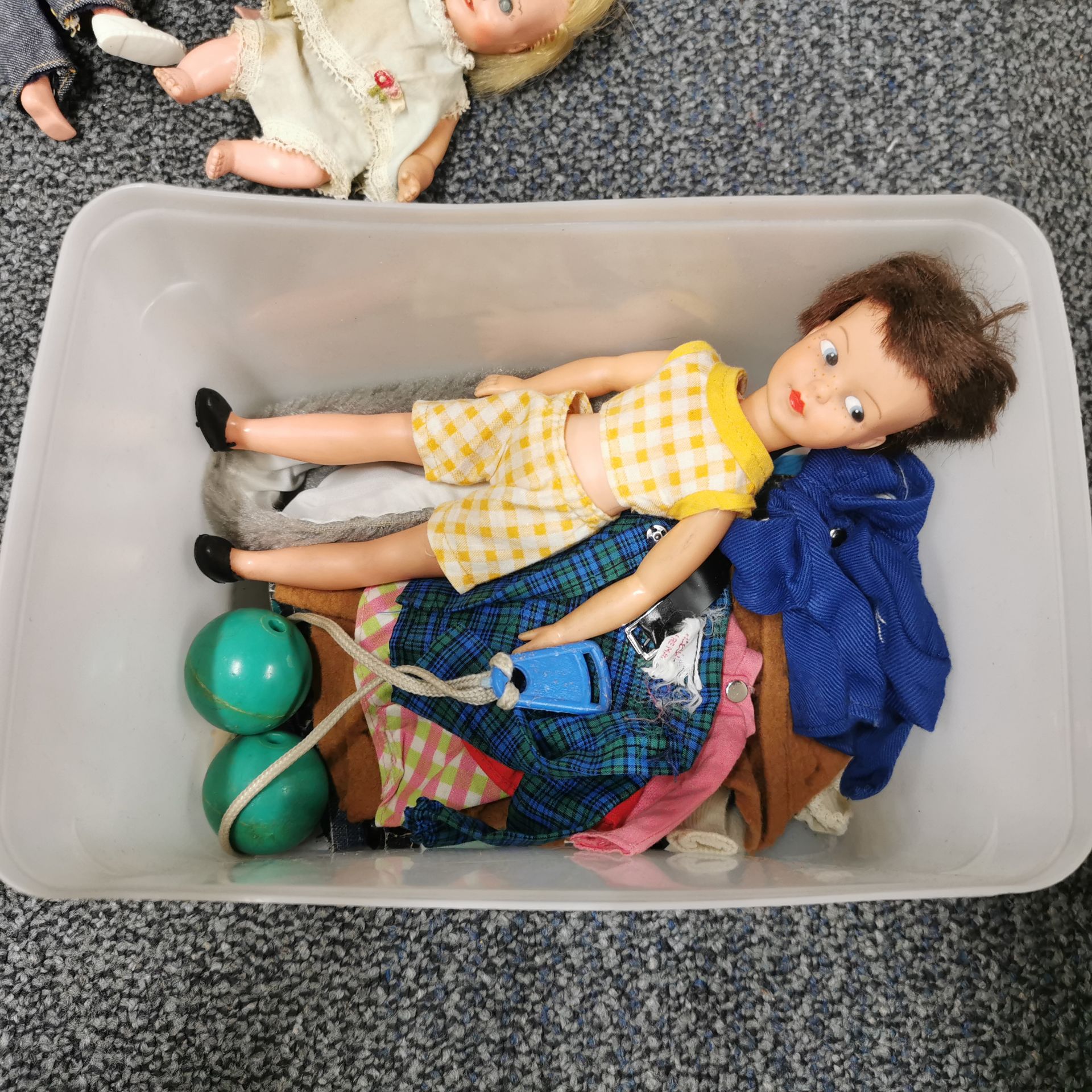 A doll's crib with a group of dolls and other items. - Image 4 of 4