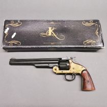 A vintage working action inert retrospective copy of a Schoffield revolver, full weight and size