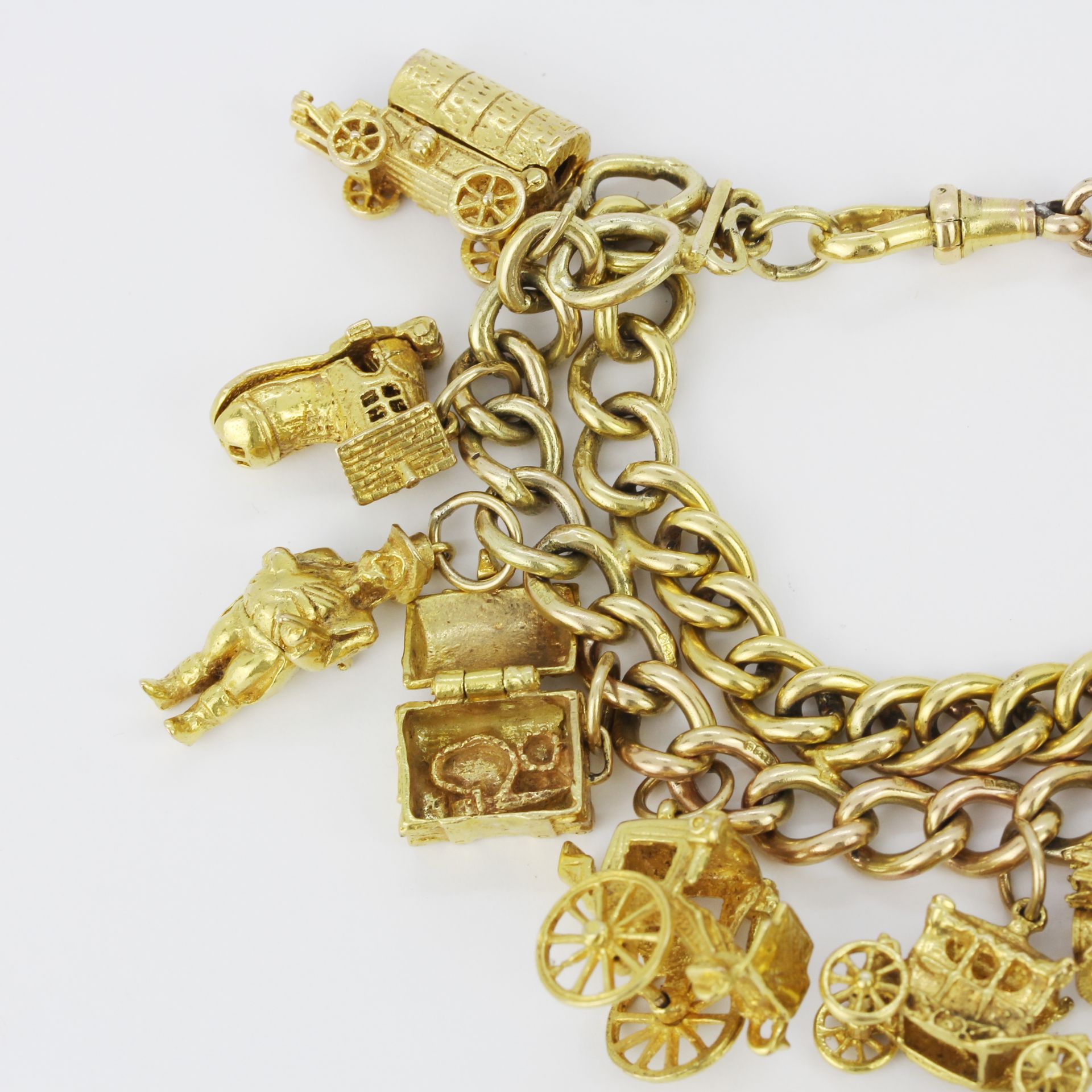 A 9ct yellow gold charm bracelet, L. 18cm. - Image 3 of 5