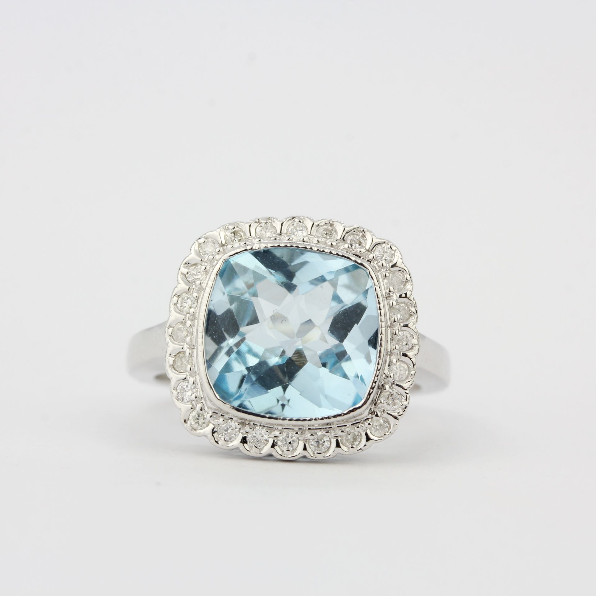 A 9ct white gold ring set with a checker board aquamarine and diamonds, ring size L. - Image 3 of 4