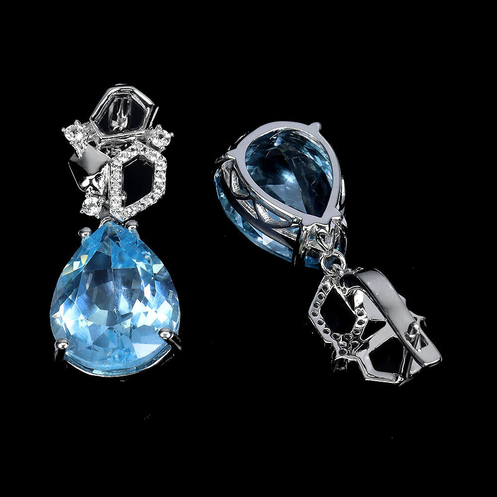 A pair of 925 silver drop earrings set with pear cut blue topaz and white stones, L. 3.1cm. - Image 2 of 2