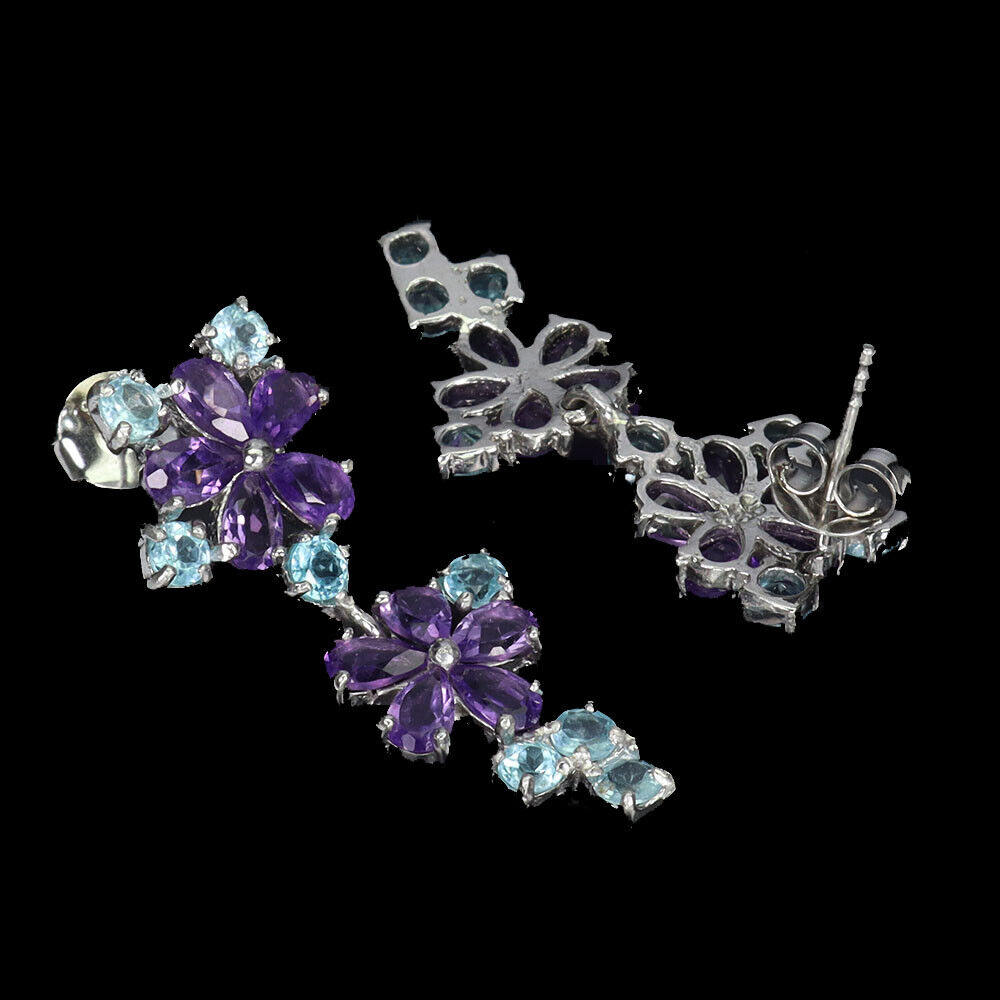 A pair of 925 silver flower shaped drop earrings set with amethysts and blue topaz, L. 3.4cm. - Image 2 of 2
