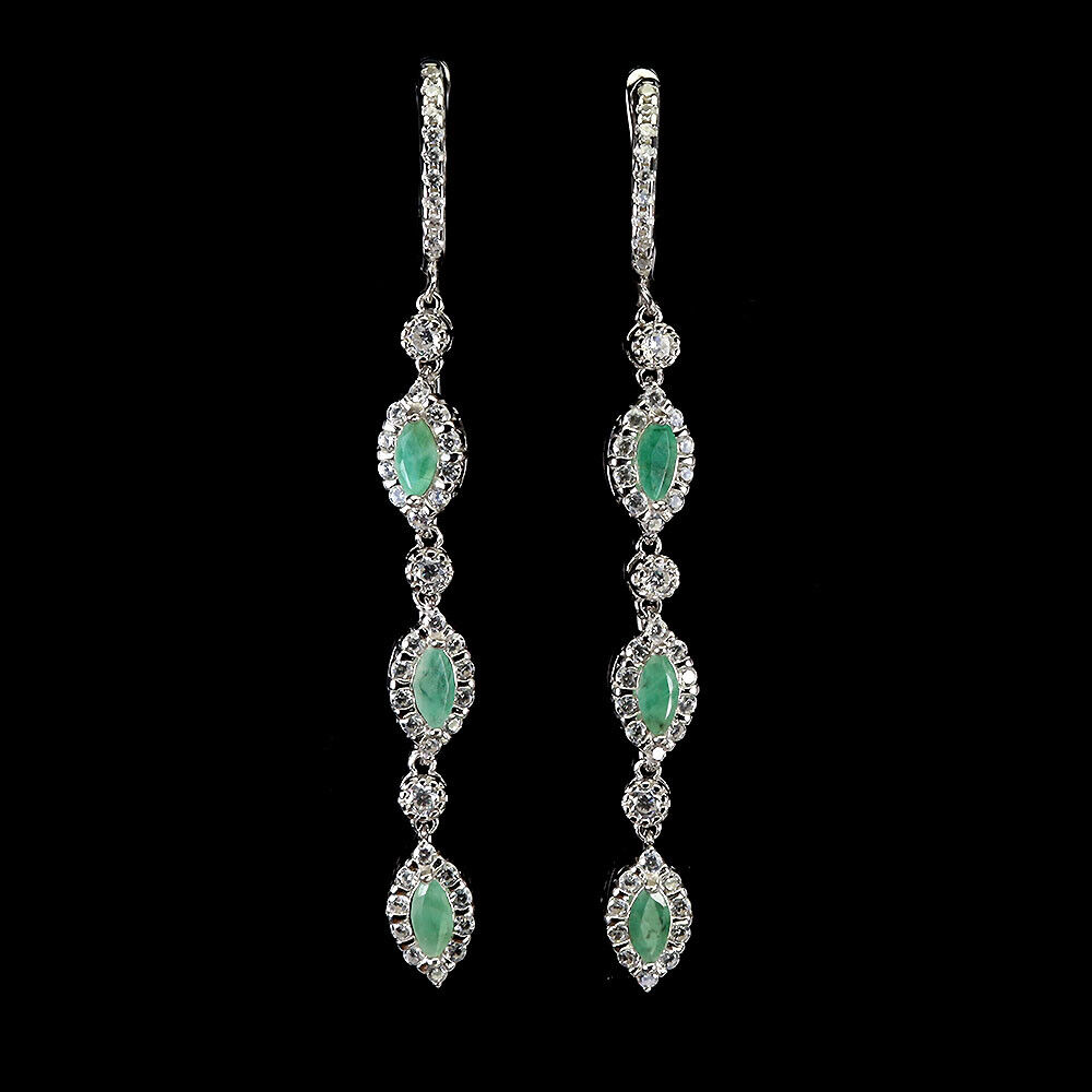 A pair of 925 silver drop earrings set with marquise cut emeralds and white stones, L. 6.2cm.