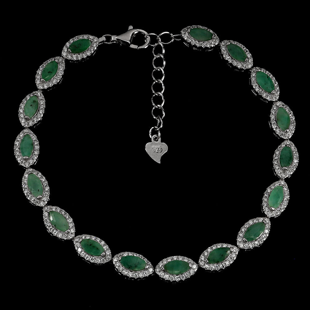 A 925 silver bracelet set with marquise cut emeralds and white stones, L. 18cm.