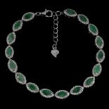 A 925 silver bracelet set with marquise cut emeralds and white stones, L. 18cm.