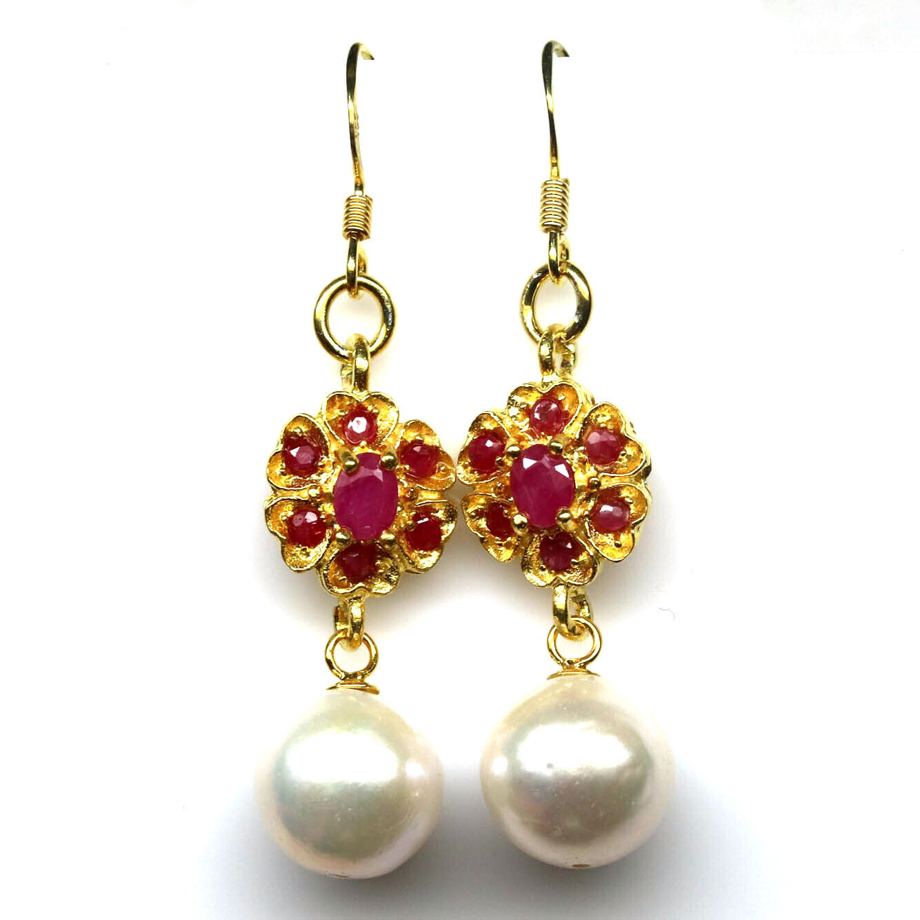 A pair of gold on 925 silver drop earrings set with rubies and pearls, L. 4.4cm.