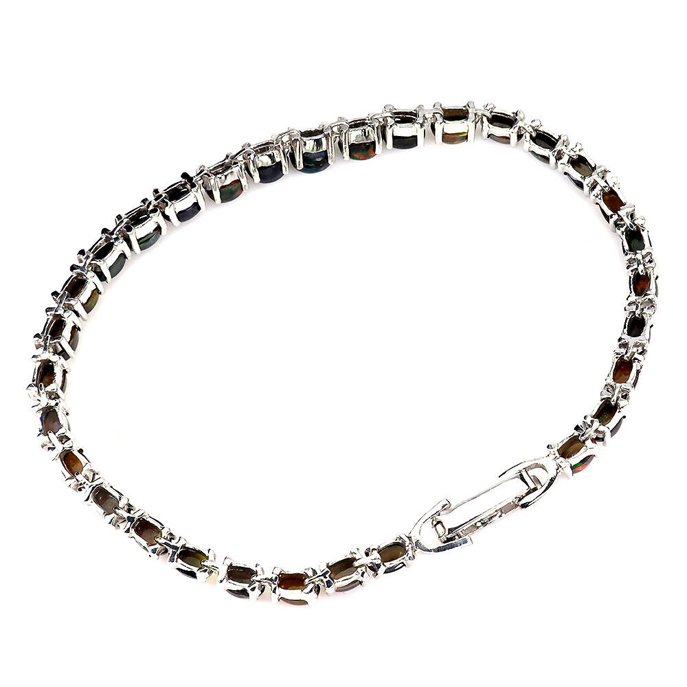 A 925 silver bracelet set with cabochon cut black opals, L. 18cm. - Image 3 of 3