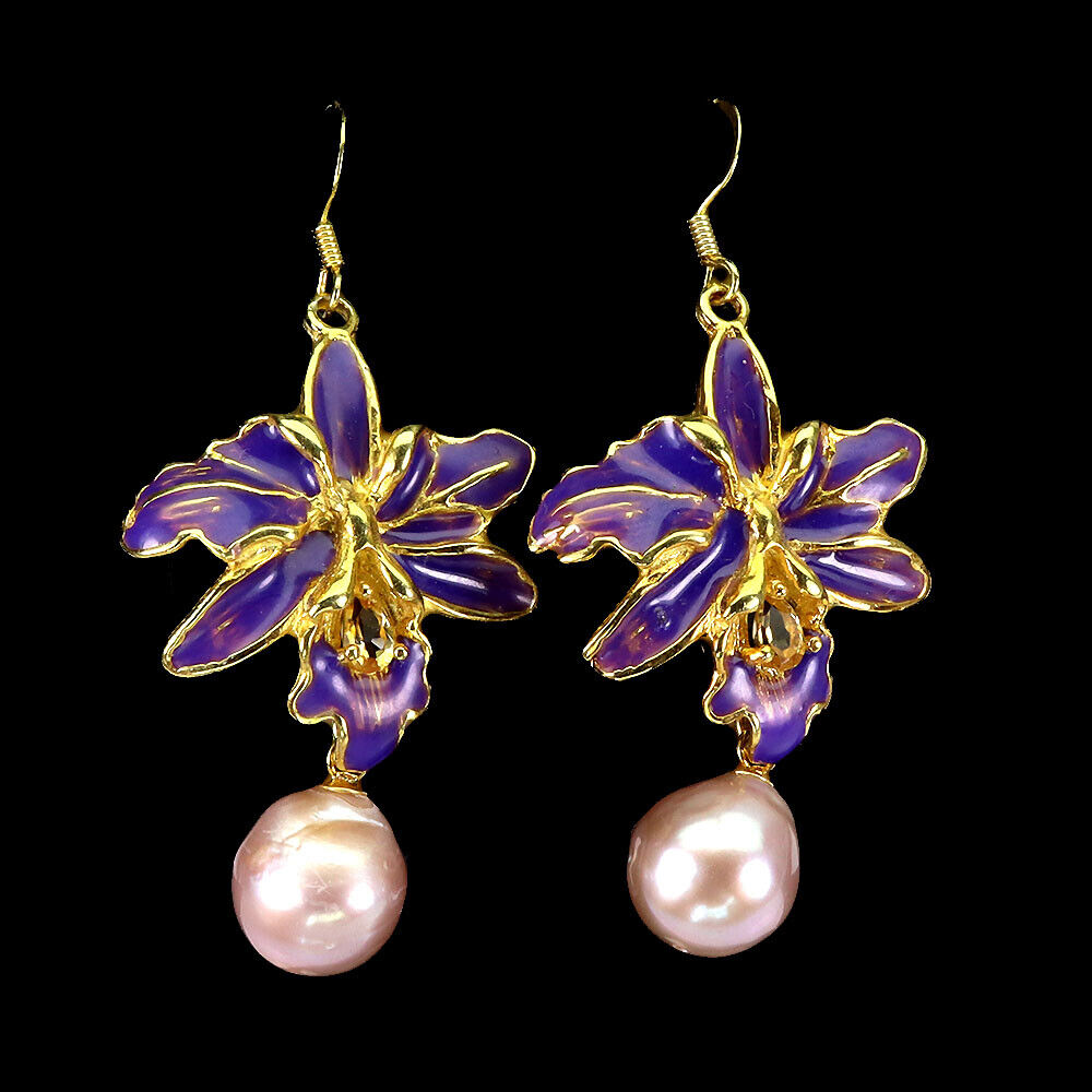 A pair of gold on 925 silver enamelled earrings set with cream pearls, L. 5.3cm.