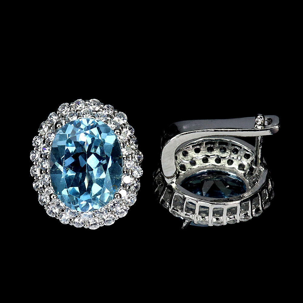 A pair of 925 silver earrings set with oval cut Swiss blue topaz and white stones, L. 1.4cm. - Image 2 of 2