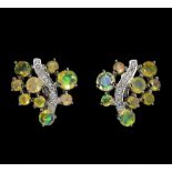 A pair of 925 silver opal and white stones set earrings, L. 1.7cm.