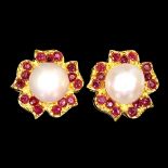 A pair of gold on 925 silver flower shaped earrings set with rubies and pearls, Dia. 2cm.