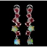 A matching pair of 925 silver drop earrings set with rubies and opals, L. 3cm.