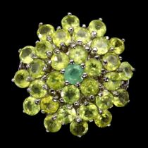 A large 925 silver cluster ring set with peridots and emeralds, dia. 2.8cm, ring size Q.