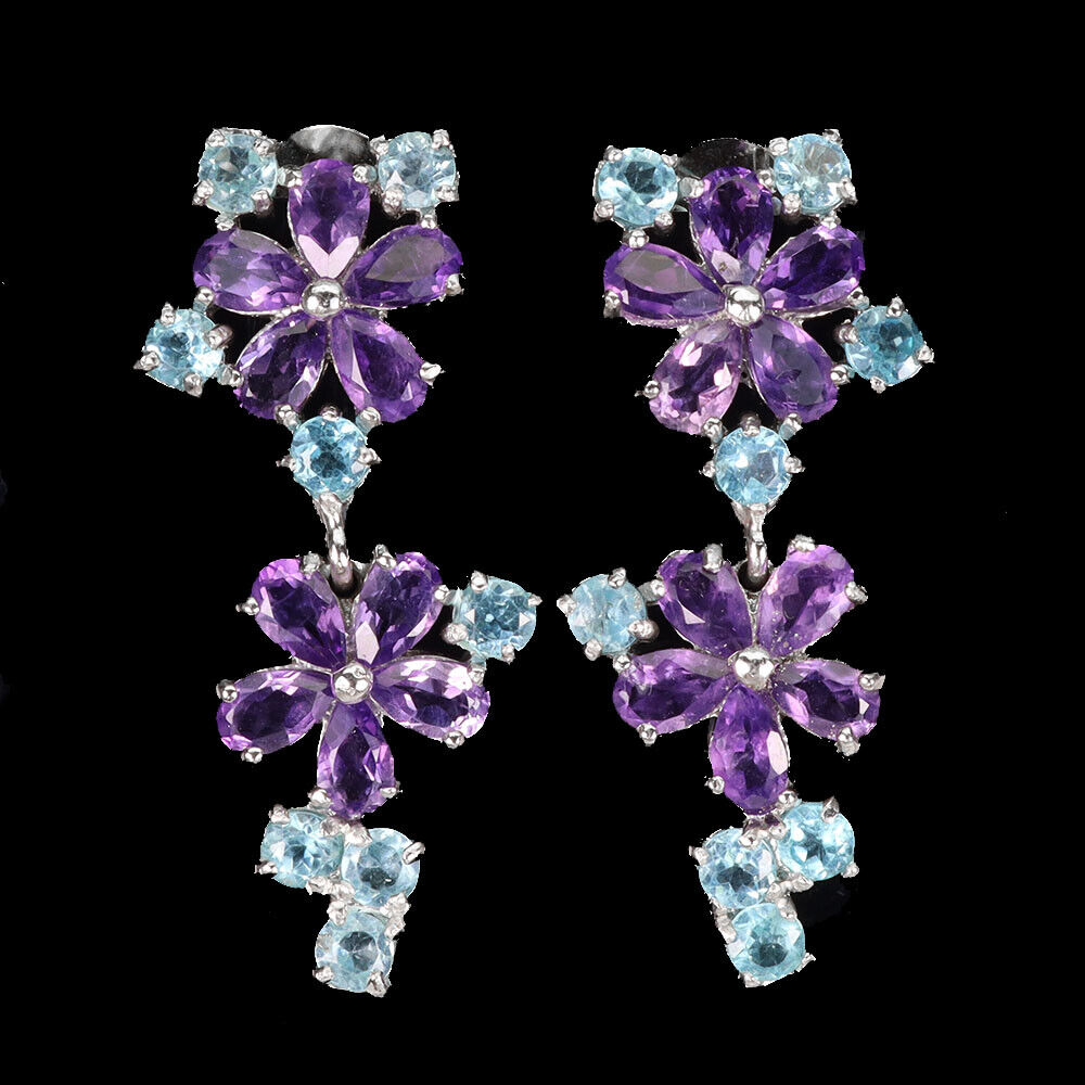 A pair of 925 silver flower shaped drop earrings set with amethysts and blue topaz, L. 3.4cm.