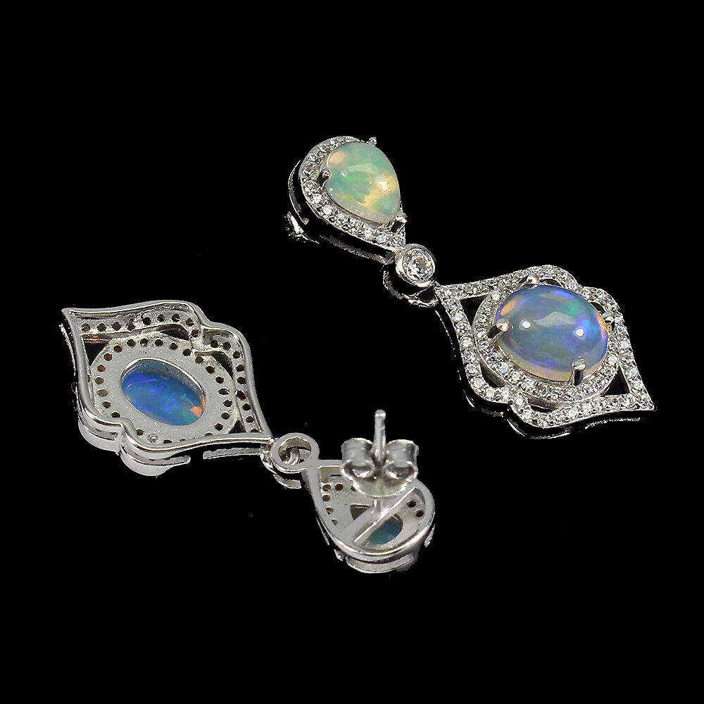 A pair of 925 silver drop earrings set with cabochon cut opal and white stones, L. 3.3cm. - Image 2 of 2
