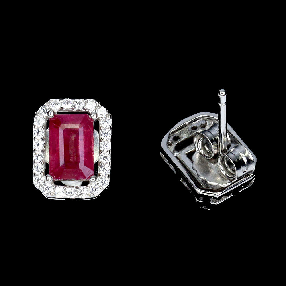 A pair of 925 silver earrings set with emerald ruby cut white stones, L. 1cm. - Image 2 of 2