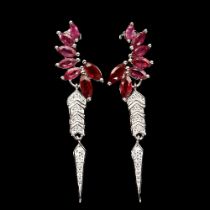 A pair of 925 silver earrings set with marquise cut rubies and white stones, L. 4.5cm.