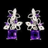 A pair of 925 silver earrings set with amethyst and white stones, L. 2.5cm.