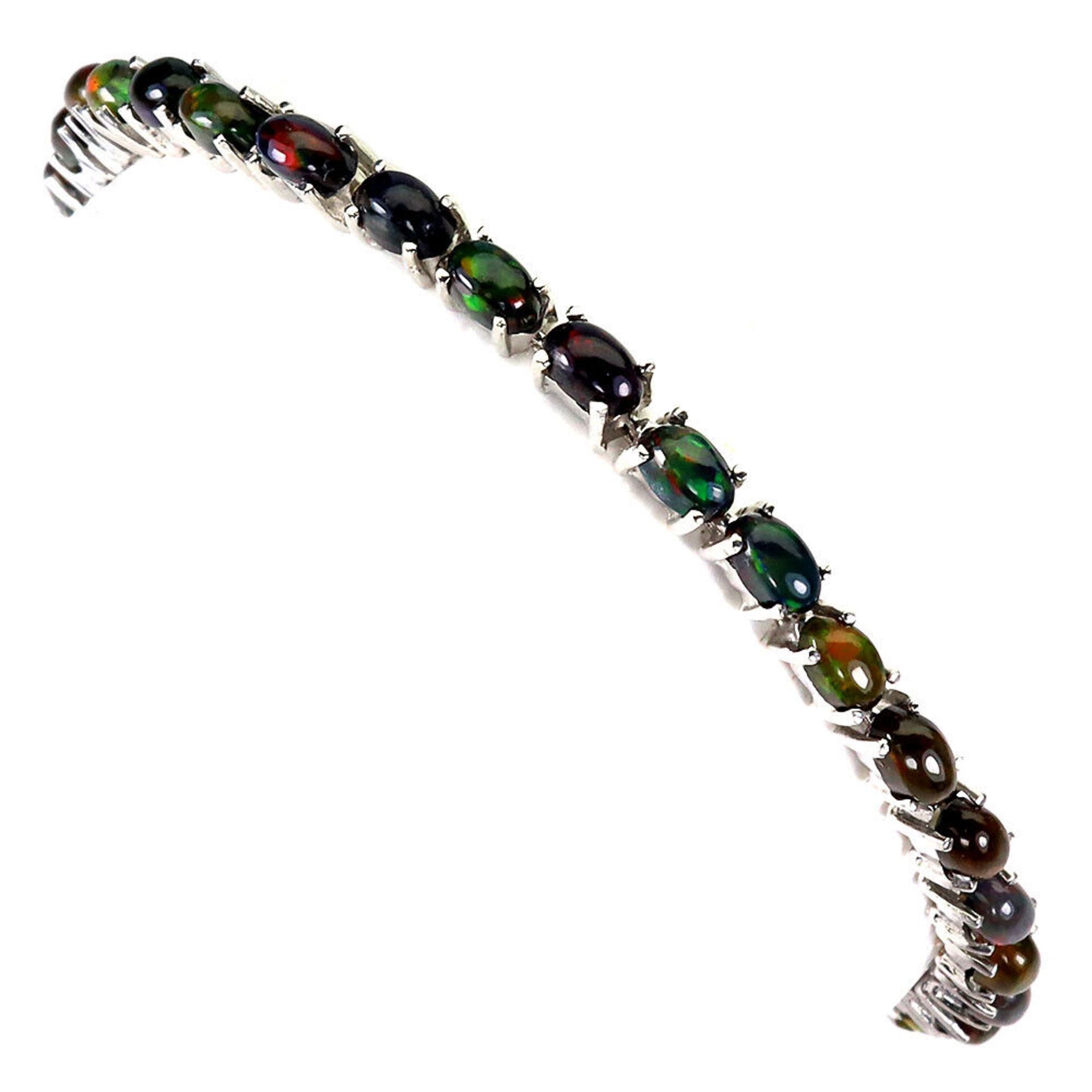 A 925 silver bracelet set with cabochon cut black opals, L. 18cm. - Image 2 of 3
