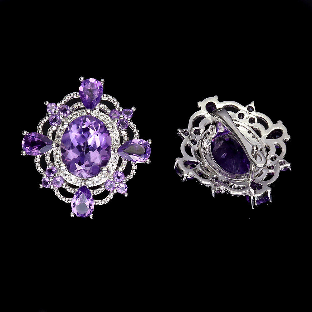 A pair of 925 silver earrings set with oval cut amethysts and white stones, L. 2.4cm. - Image 2 of 2
