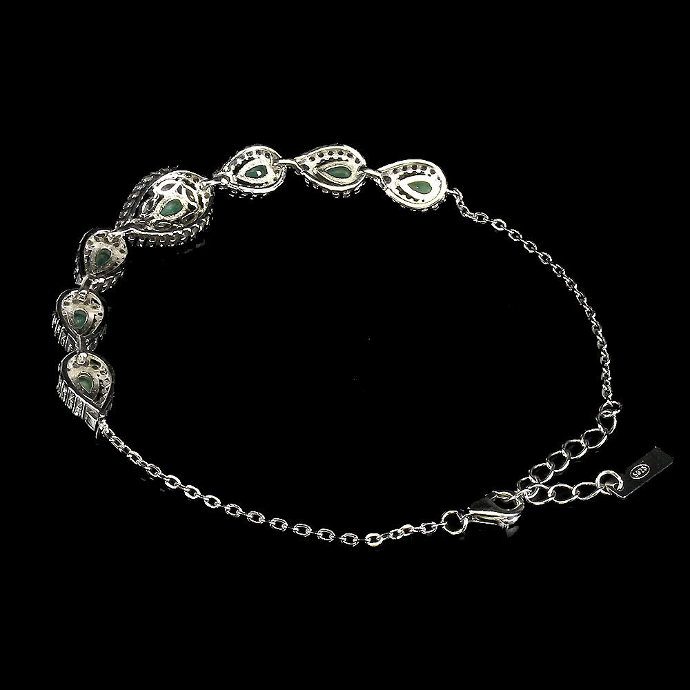 A 925 silver bracelet set with pear cut emeralds and white stones, L. 17cm. - Image 3 of 3