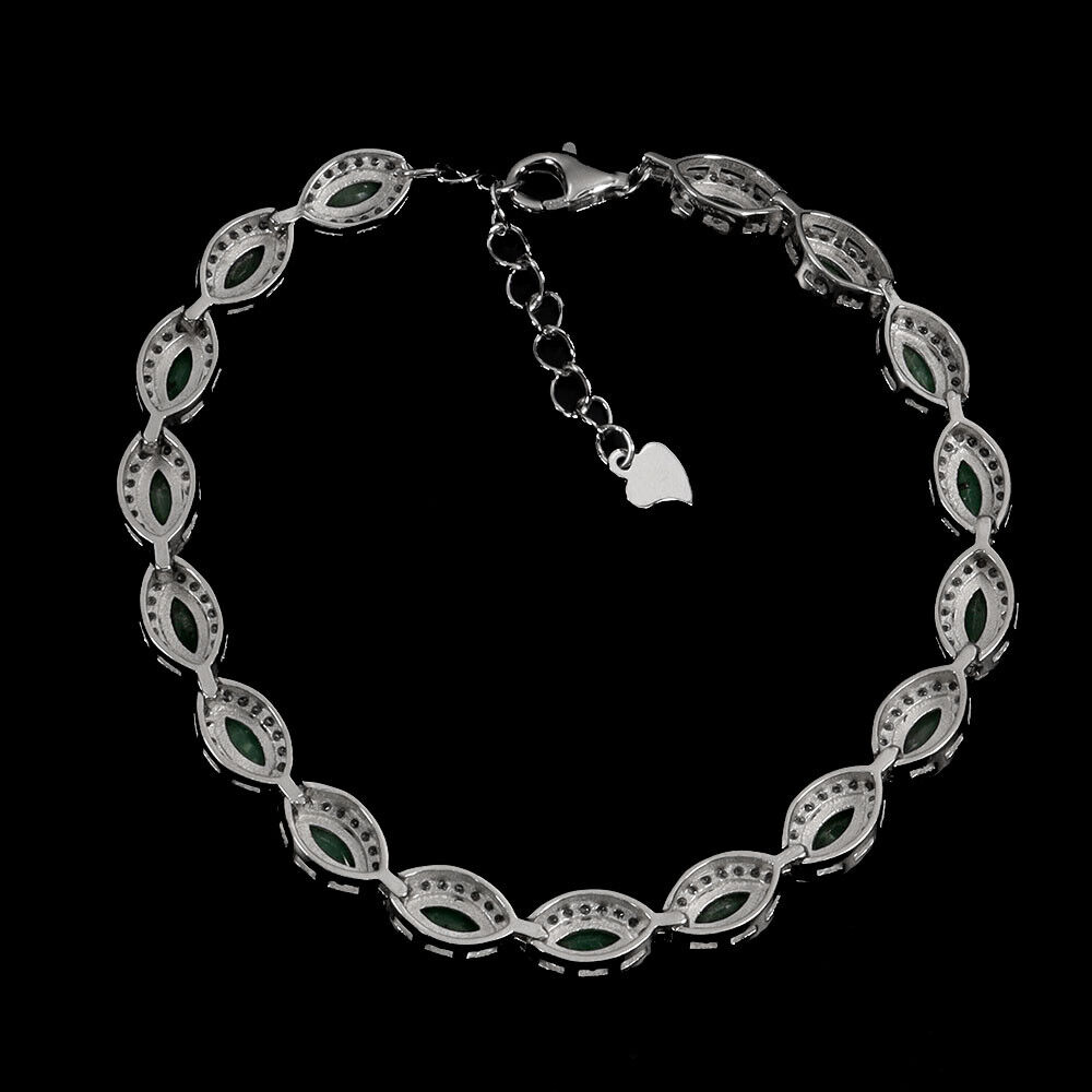 A 925 silver bracelet set with marquise cut emeralds and white stones, L. 18cm. - Image 3 of 3